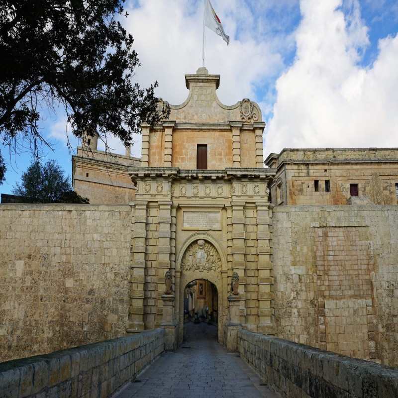 Link to wikipedia page of Mdina main gate.  Image shows Mdina gate from Rabat.